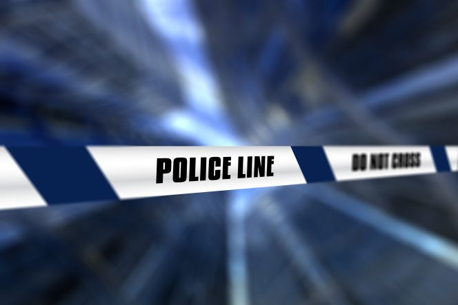 
					3D render of a police line tape against defocussed background. Foto Freepik.
